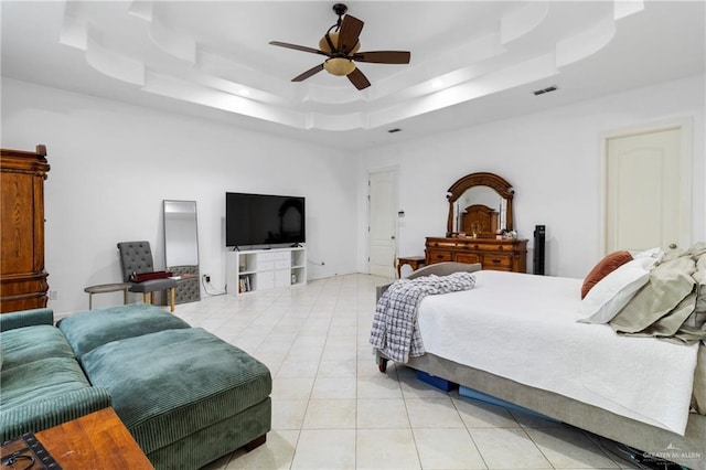 6614 Mile 7 Rd, Mission, TX 78573 - bedroom featuring a tray ceiling, light tile patterned floors, and ceiling fan