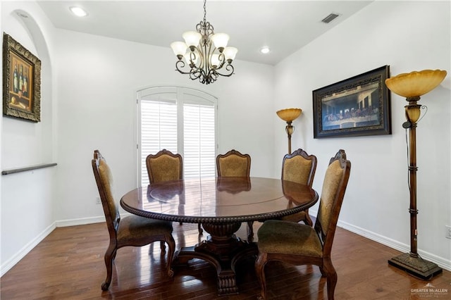 6614 Mile 7 Rd, Mission, TX 78573 - dining area with wood finished floors, a chandelier, baseboards, and recessed lighting