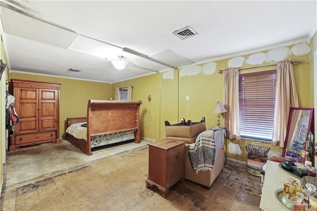 bedroom featuring tile patterned floors, visible vents, and ornamental molding