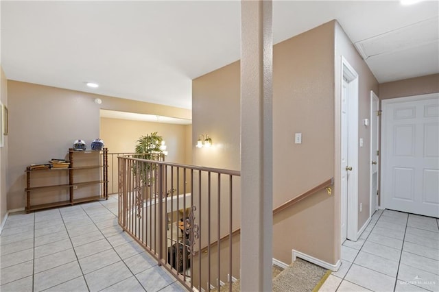 2315 E Sprague St, Edinburg, TX 78542 - corridor featuring light tile patterned floors, baseboards, an upstairs landing, and recessed lighting