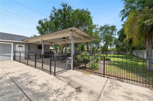 2315 E Sprague St, Edinburg, TX 78542 - view of community featuring driveway, a yard, a garage, fence private yard, and a carport