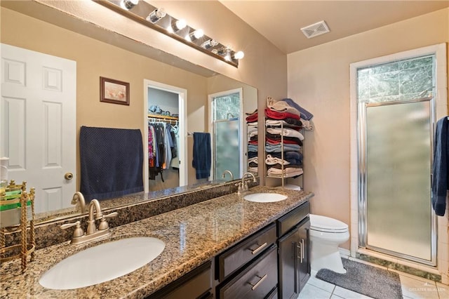 2315 E Sprague St, Edinburg, TX 78542 - full bath featuring a stall shower, tile patterned flooring, visible vents, and a sink