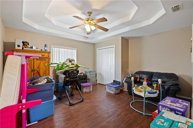 2315 E Sprague St, Edinburg, TX 78542 - game room featuring a raised ceiling, a ceiling fan, visible vents, and wood finished floors