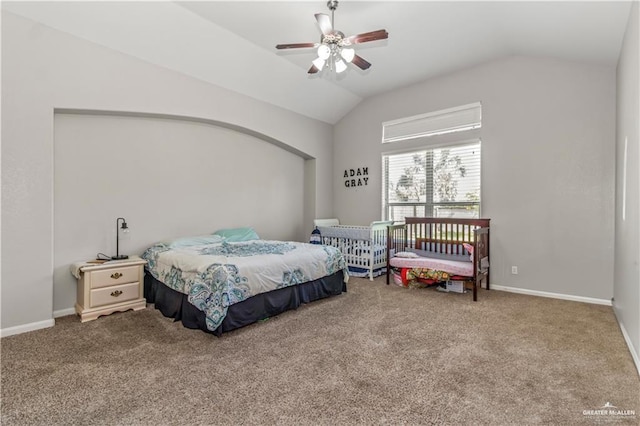 bedroom with ceiling fan, carpet, and vaulted ceiling