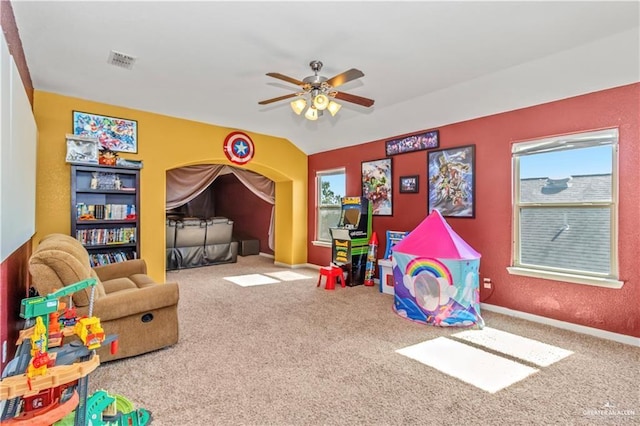 rec room with carpet flooring and ceiling fan