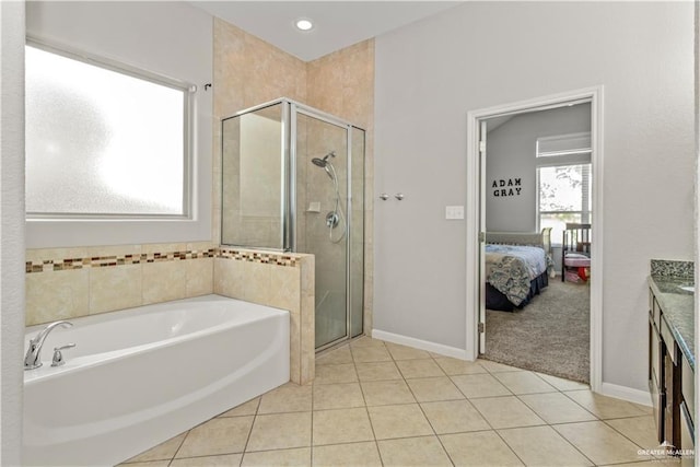 bathroom featuring tile patterned flooring and plus walk in shower