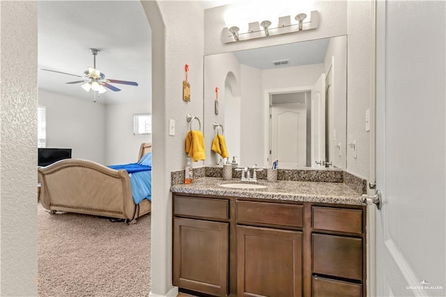 bathroom with vanity and ceiling fan