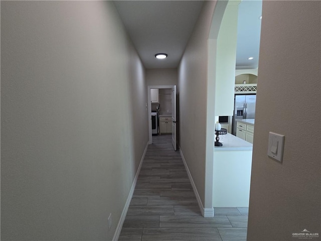 hallway featuring dark wood-type flooring