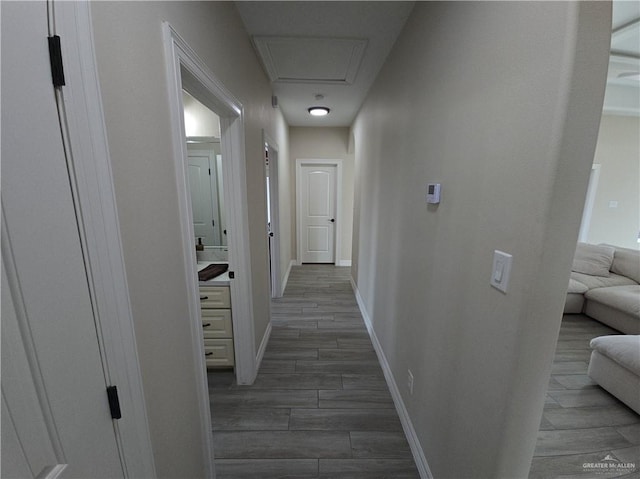 hall with dark wood-type flooring