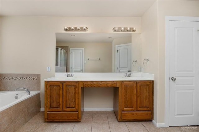 bathroom featuring plus walk in shower, tile patterned flooring, and vanity