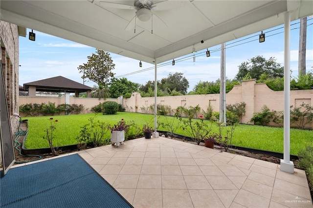 view of patio with ceiling fan