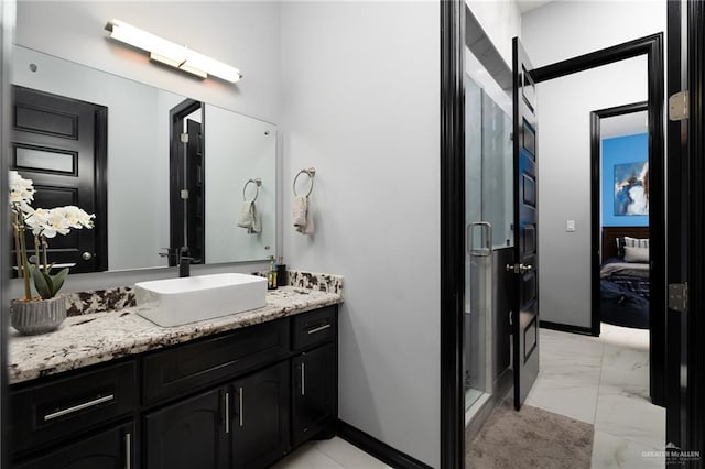 bathroom with vanity and walk in shower