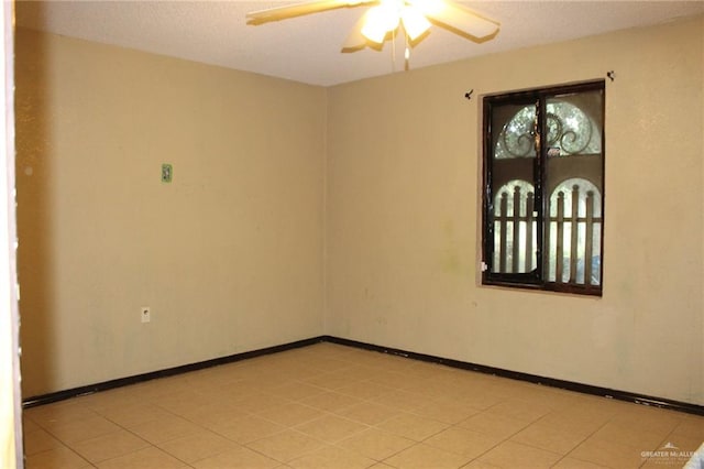 unfurnished room featuring ceiling fan