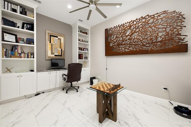 office area featuring marble finish floor, ceiling fan, recessed lighting, built in features, and built in study area
