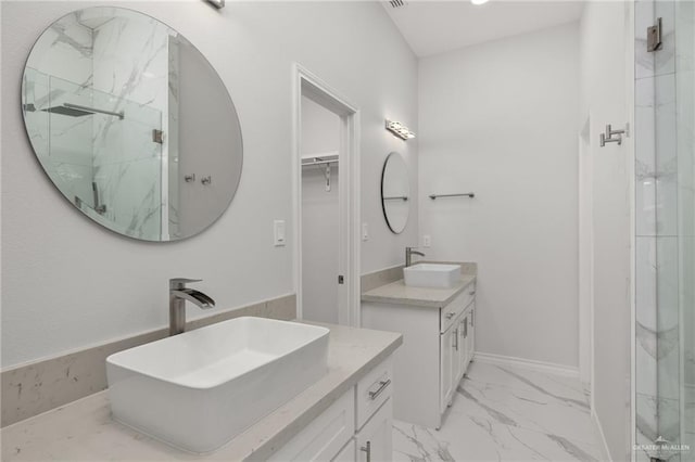 9218 N 25th St, Mcallen, TX 78504 - full bath featuring a marble finish shower, marble finish flooring, and two vanities
