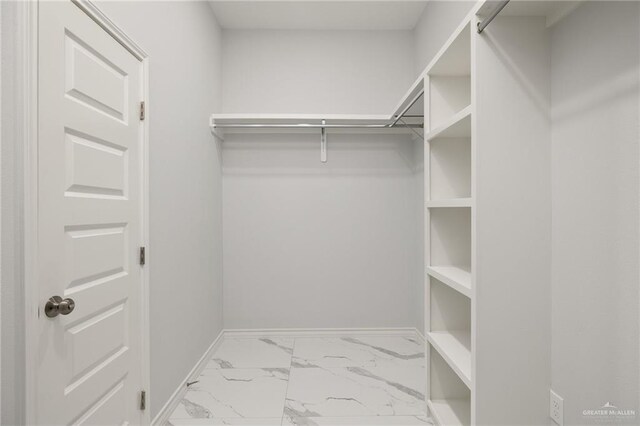 9218 N 25th St, Mcallen, TX 78504 - spacious closet featuring marble finish floors