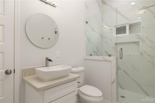 9218 N 25th St, Mcallen, TX 78504 - bathroom with a marble finish shower, toilet, and vanity