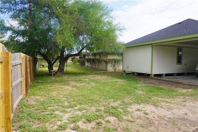 view of yard with fence