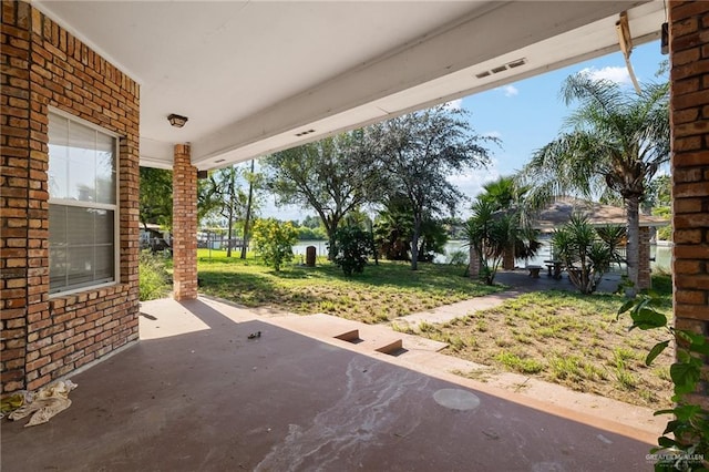 view of patio / terrace featuring a water view