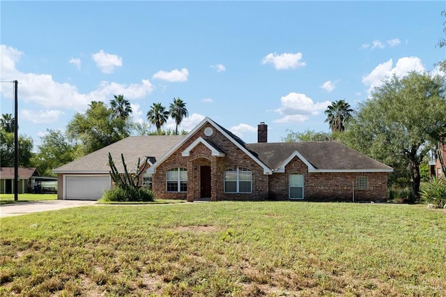 ranch-style house featuring a front lawn and a garage