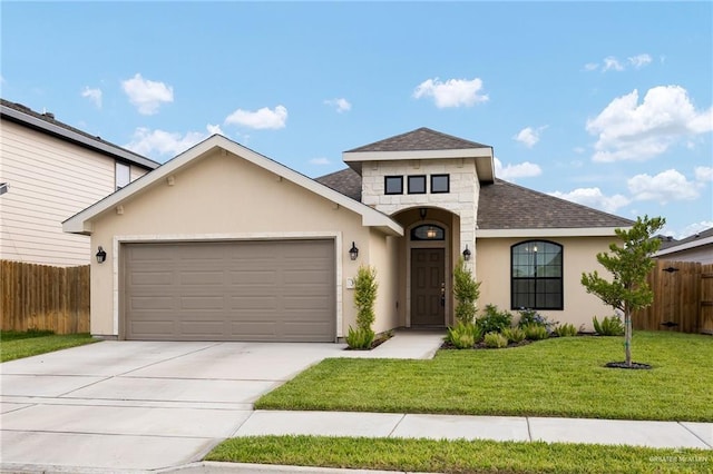 french country inspired facade featuring an attached garage, a shingled roof, concrete driveway, and stucco siding