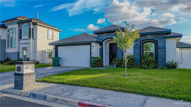 1003 Pear St W, Pharr, TX 78677 - view of front facade with an attached garage, a front yard, driveway, stucco siding, and a shingled roof