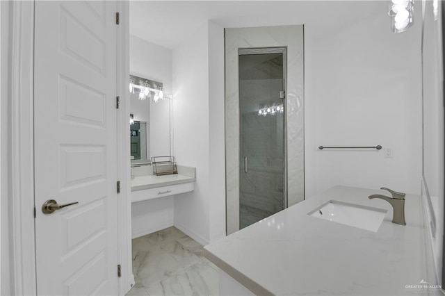 full bath with marble finish floor, baseboards, vanity, and a marble finish shower