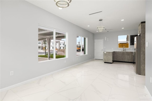 interior space with sink and plenty of natural light