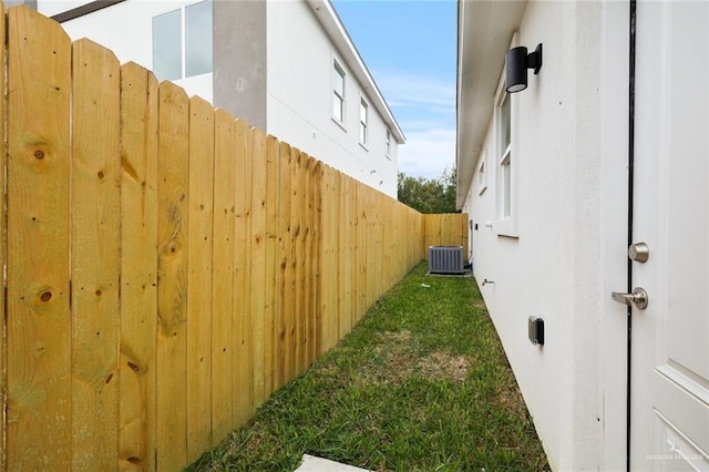 view of yard with central AC