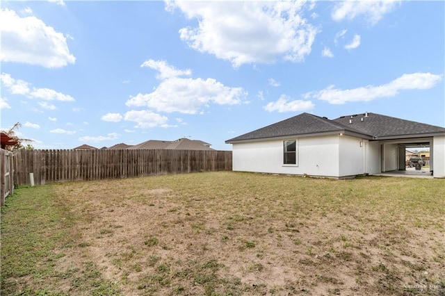 view of yard with a fenced backyard and a patio