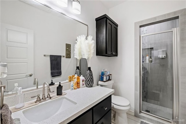 903 W Smith Dr, Pharr, TX 78577 - full bath featuring vanity, toilet, tile patterned flooring, and a stall shower