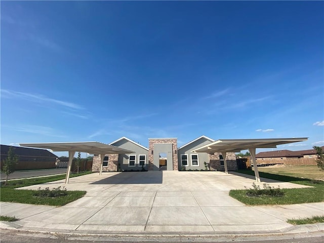 view of front of property with a carport