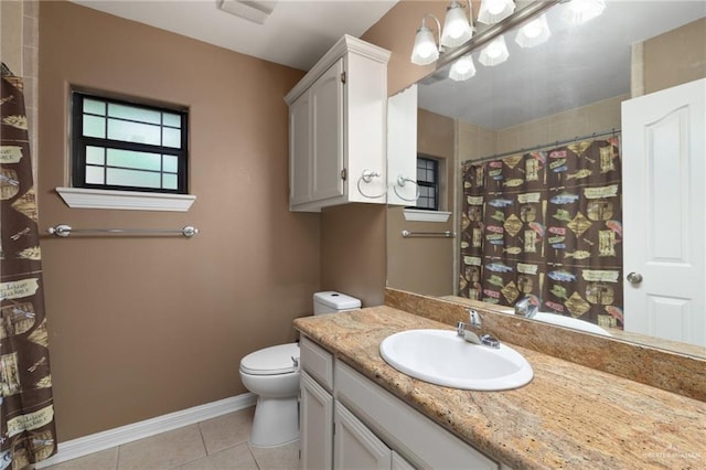 1614 Gabriels Lndg, Harlingen, TX 78550 - full bathroom featuring toilet, vanity, tile patterned floors, baseboards, and a shower with curtain