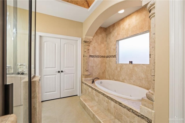 2000 Queens Ave, Mcallen, TX 78504 - full bathroom featuring a whirlpool tub, tile patterned floors, and a shower with door