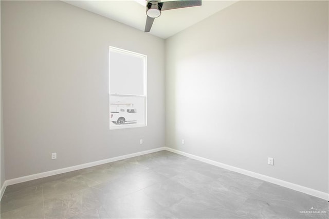 unfurnished room with ceiling fan