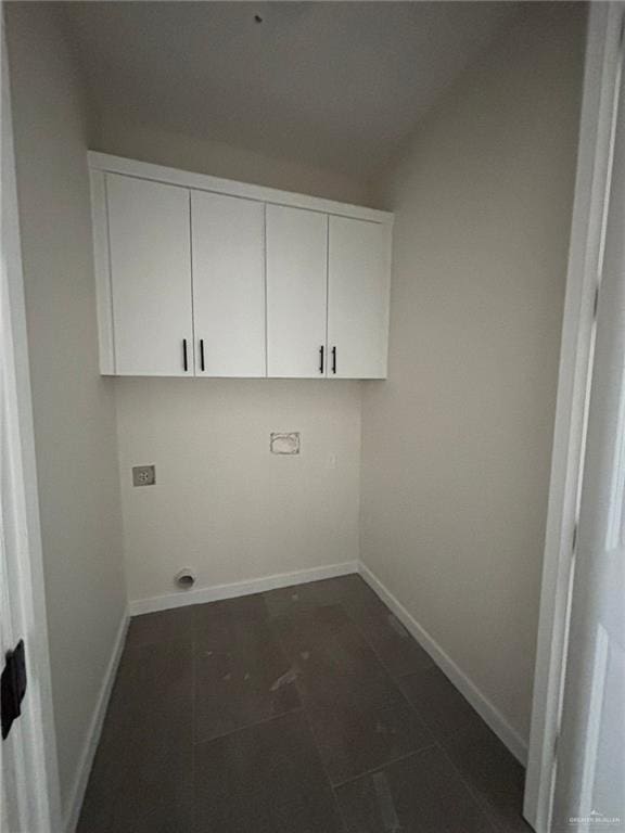 2213 Dorado Dr, Mission, TX 78573 - washroom with electric dryer hookup and cabinet space