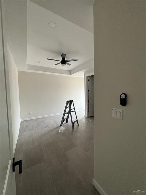 2213 Dorado Dr, Mission, TX 78573 - unfurnished room with a ceiling fan and a tray ceiling