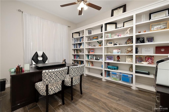 home office featuring ceiling fan and dark hardwood / wood-style floors