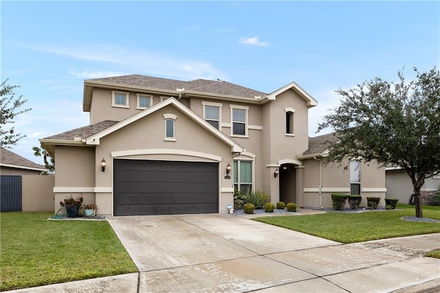 front of property featuring a garage and a front yard