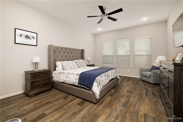 bedroom with ceiling fan and dark hardwood / wood-style floors