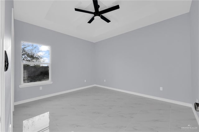 spare room with ceiling fan