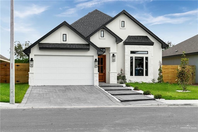 3404 Yellowhammer Ave, Mcallen, TX 78504 - view of front of property with a garage, stucco siding, concrete driveway, and a shingled roof