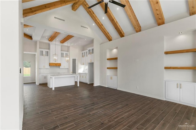 3404 Yellowhammer Ave, Mcallen, TX 78504 - unfurnished living room with ceiling fan, beam ceiling, high vaulted ceiling, recessed lighting, and dark wood-style flooring