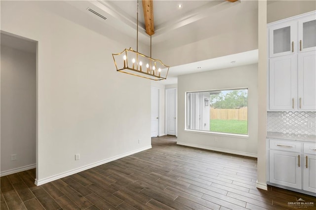 3404 Yellowhammer Ave, Mcallen, TX 78504 - unfurnished dining area with dark wood-style flooring, a chandelier, baseboards, recessed lighting, and beamed ceiling