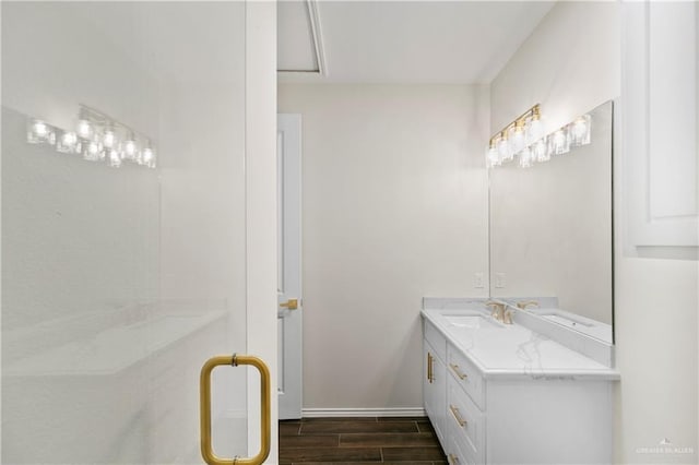 3404 Yellowhammer Ave, Mcallen, TX 78504 - bathroom with wood finished floors, vanity, and baseboards