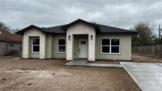 view of front of home with central AC unit