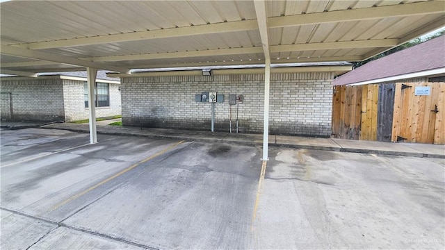 exterior space with a carport