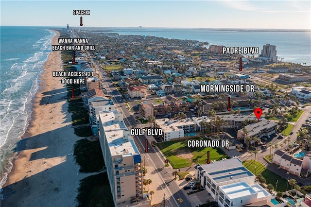 drone / aerial view with a view of the beach and a water view