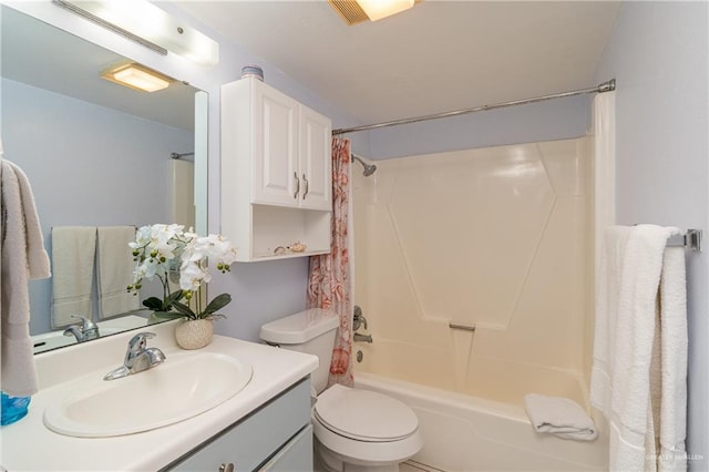 full bathroom featuring vanity, toilet, and shower / bathtub combination with curtain