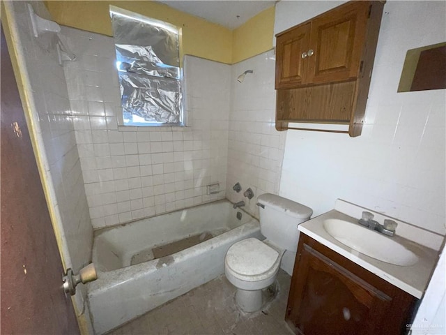 bathroom with vanity, bathing tub / shower combination, and toilet